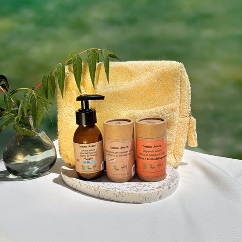 Trousse gialla con i cosmetici Comme Avant
