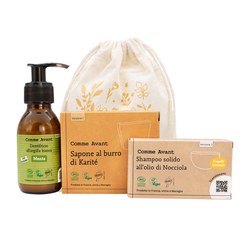 Cofanetto con prodotti essenziali: sapone al karité, shampoo solido all'olio di nocciola e dentifricio all'argilla bianca